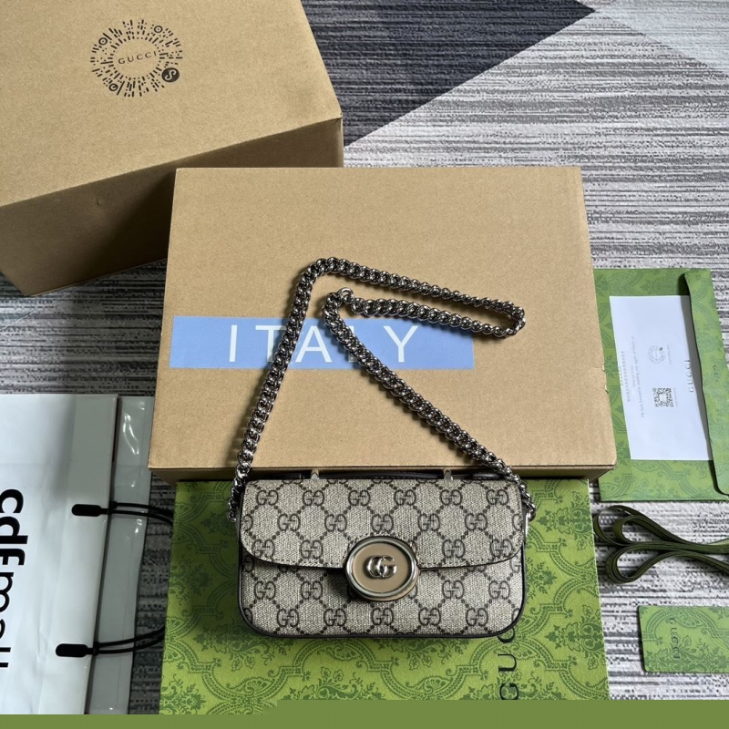 G*u*i satchel bags